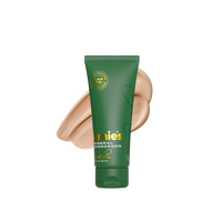 Green tube of Jemies sunscreen with a swatch on a white background