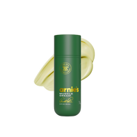Green bottle of Arnies Muscle Cream with a yellow circular design on a white background