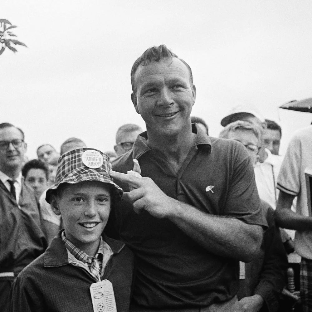Arnold Palmer smiling beside a boy wearing an Arnie's Army button, Ligonier, Pennsylvania, 1965